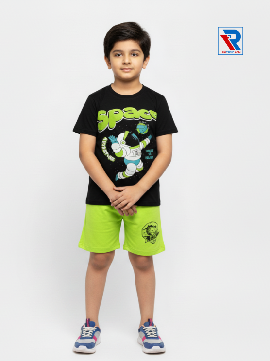Boys clothing set 2–10 years black t‑shirt and green shorts, folded arms pose Riotrend apparel.