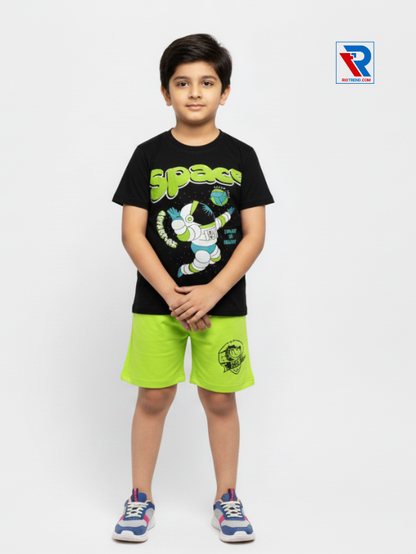 Boys clothing set 2–10 years black t‑shirt and green shorts, folded arms pose Riotrend apparel.