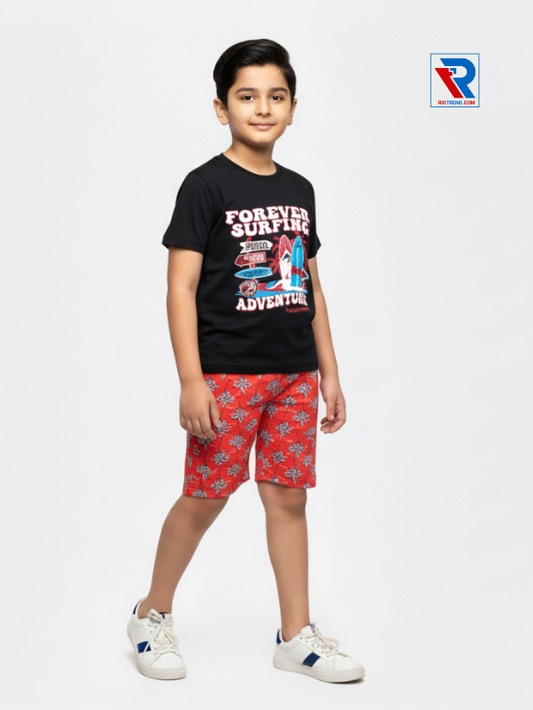 Boys clothing set 2–10 years with black t‑shirt and scarlet shorts, relaxed side view by Riotrend.