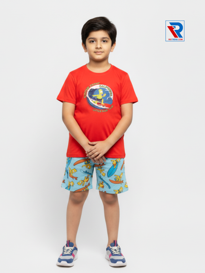 Boys clothing set 2–10 years orange t‑shirt and cyan shorts, folded arms pose Riotrend apparel.