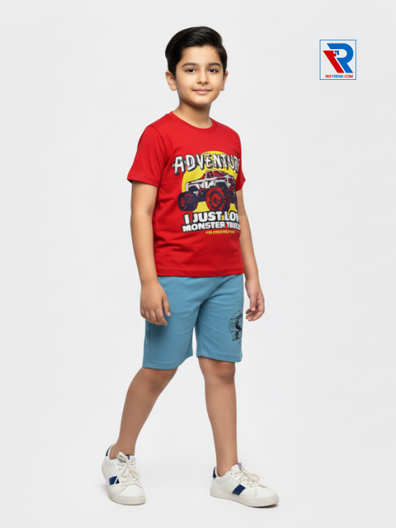 Boys clothing set 2–10 years with red t‑shirt and blue shorts, relaxed side view by Riotrend.
