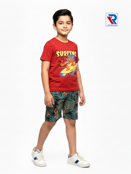 Boys clothing set 2–10 years with red t‑shirt and laurel green shorts, relaxed side view by Riotrend.
