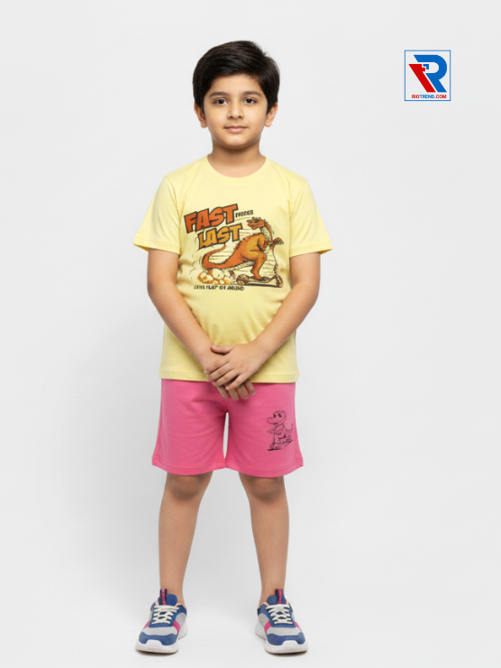 Boys clothing set 2–10 years yellow t‑shirt and pink shorts, folded arms pose Riotrend apparel.