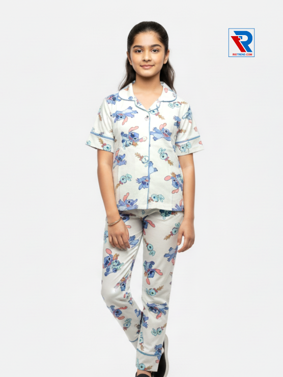 Girls night suit set, ages 7–12, bright whitest white top and pyjama pants, folded‑legs view – RioTrend kids sleepwear showcasing a casual, relaxed pose.