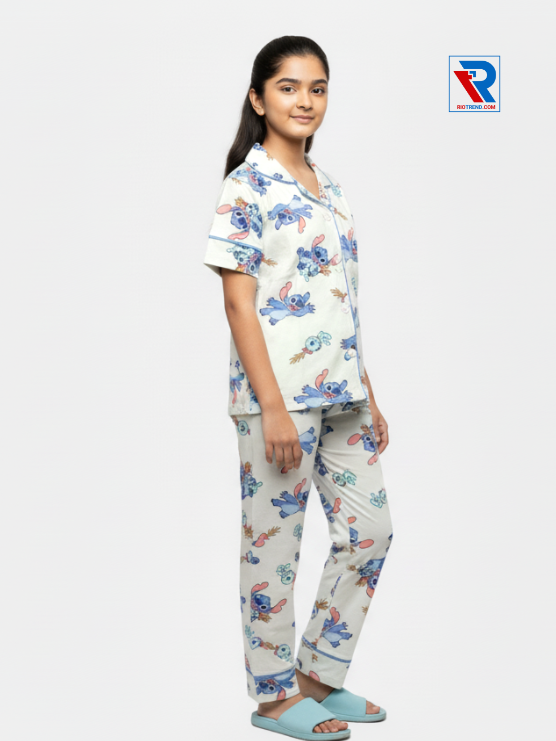 Girls night suit set, ages 7–12, bright whitest white top and pyjama pants, relaxed pose right view – RioTrend kids sleepwear emphasizing everyday comfort and style.