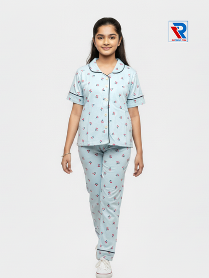 Girls night suit set, ages 7–12, charming dark stylish blue top and pyjama pants, front view – RioTrend kids sleepwear highlighting design and comfort.