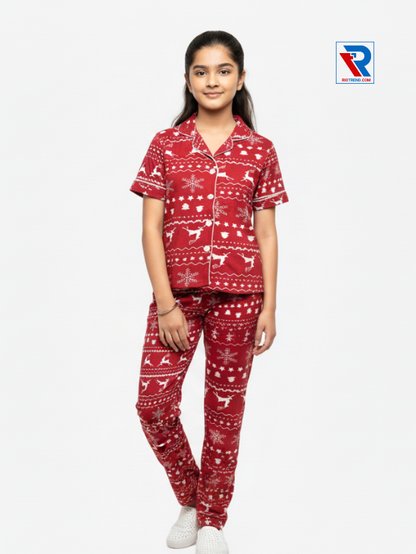 Girls night suit set, ages 7–12, charming red top and pyjama pants, folded‑leg view – RioTrend kids sleepwear showcasing a casual, relaxed pose.