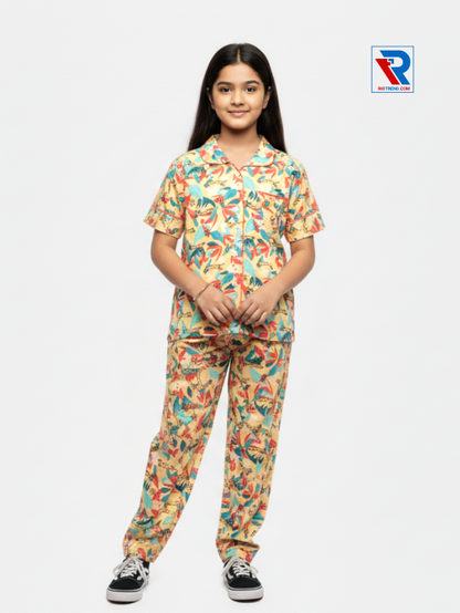 Girls night suit set, ages 7–12, comfort yellow top and pyjama pants, folded‑arms pose view – RioTrend kids sleepwear showcasing a confident, casual look.