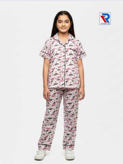 Girls night suit set, ages 7–12, cream top and pyjama pants, relaxed pose view – RioTrend kids sleepwear emphasizing everyday comfort and style.