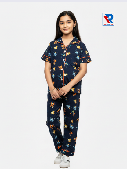 Girls night suit set, ages 7–12, dark deep blue top and pyjama pants, folded‑leg view – RioTrend kids sleepwear showcasing a casual, relaxed pose.