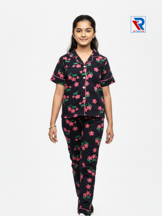 Girls night suit set, ages 7–12, elegant black top and pyjama pants, front view – RioTrend kids sleepwear highlighting design and comfort.