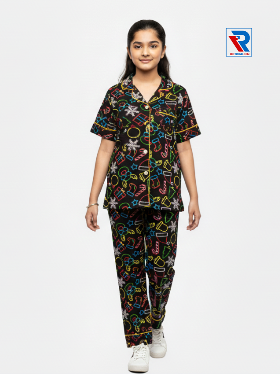 Girls night suit set, ages 7–12, sleek black top and pyjama pants, front view – RioTrend kids sleepwear highlighting design and comfort.