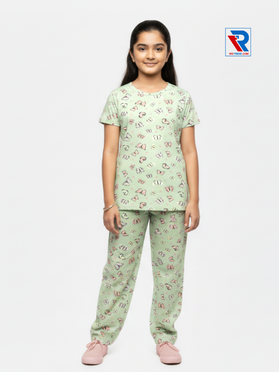 Girls pyjama set in light green color, ages 1–12, relaxed pose view – RioTrend kids sleepwear emphasizing everyday comfort and style.