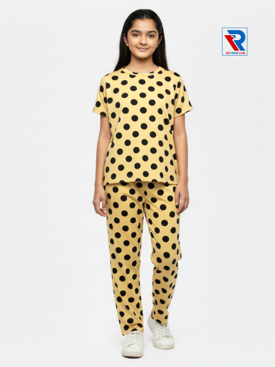 Girls pyjama set in mustard color, ages 1–12, natural standing view – RioTrend kids sleepwear highlighting everyday comfort and style.