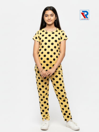 Girls pyjama set in mustard color, ages 1–12, relaxed pose view – RioTrend kids sleepwear highlighting comfort and casual style.
