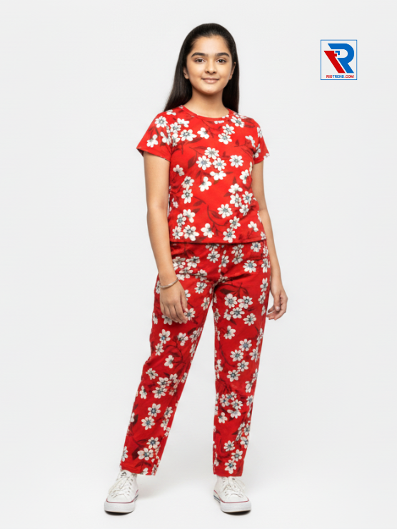 Girls pyjama set in red color, ages 1–12, relaxed pose view – RioTrend kids sleepwear emphasizing everyday comfort and style.
