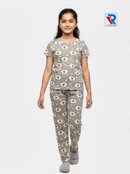 Girls pyjama set in tan color, ages 1–12, relaxed pose view – RioTrend kids sleepwear showcasing everyday comfort and style.