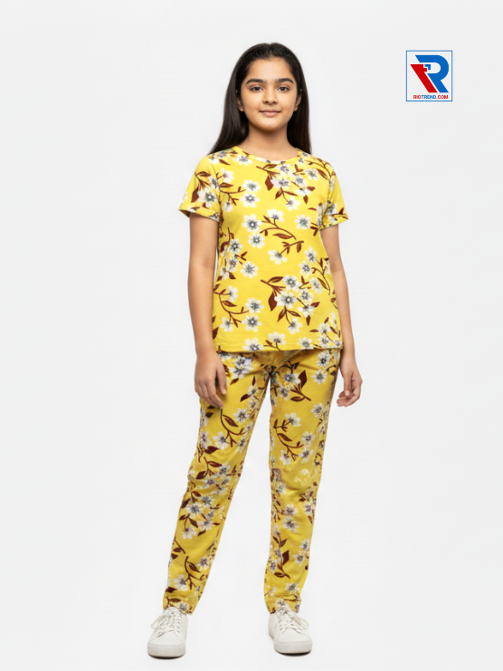 Girls pyjama set in yellow color, ages 1–12, relaxed pose view – RioTrend kids sleepwear emphasizing everyday comfort and style.