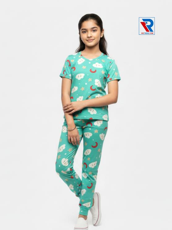 Girls pyjama set in cyan, ages 1–12, folded‑leg and folded‑arms view – RioTrend kids sleepwear showcasing a casual, relaxed pose.