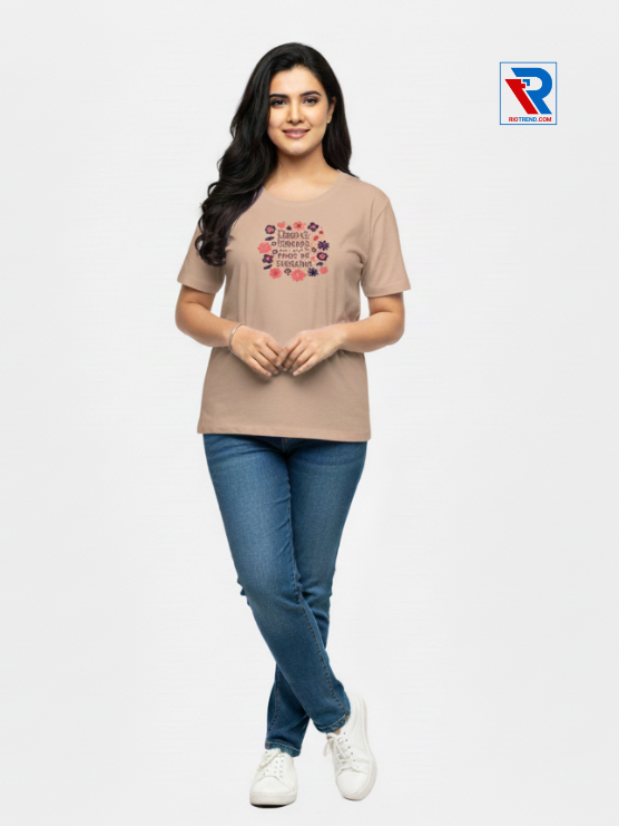 Women's stylish peach half-sleeve t-shirt, sizes M-L-XL-XXL, soft cotton casual wear displayed with folded arms and legs, Riotrend.