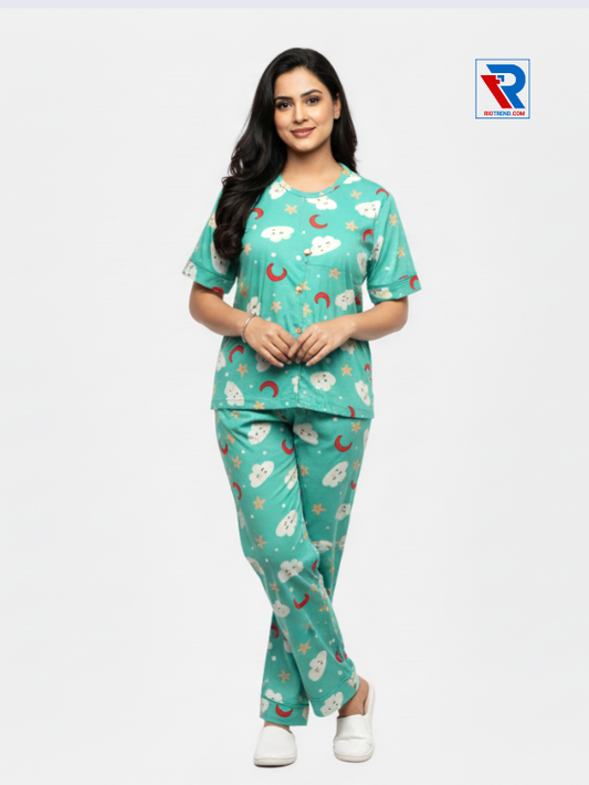 Women’s pyjama set, sizes M–XL, cyan top and pyjama pants, folded‑leg arms view – RioTrend sleepwear showcasing a casual, relaxed pose.