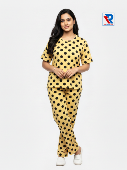 Women’s pyjama set, sizes M–XL, mustard top and pyjama pants, folded‑leg arms view – RioTrend sleepwear showcasing a casual, relaxed pose.