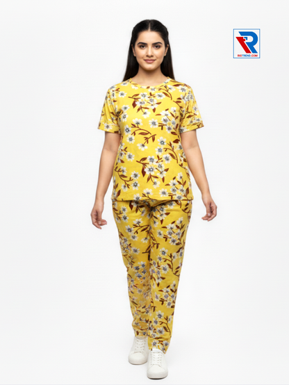 Women’s pyjama set, sizes M–XL, yellow top and pyjama pants, relaxed pose view – RioTrend sleepwear emphasizing everyday comfort and style.